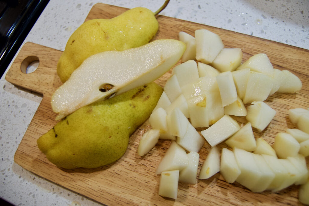 Chopping the pears into 1 inch chunks for quick pear butter.