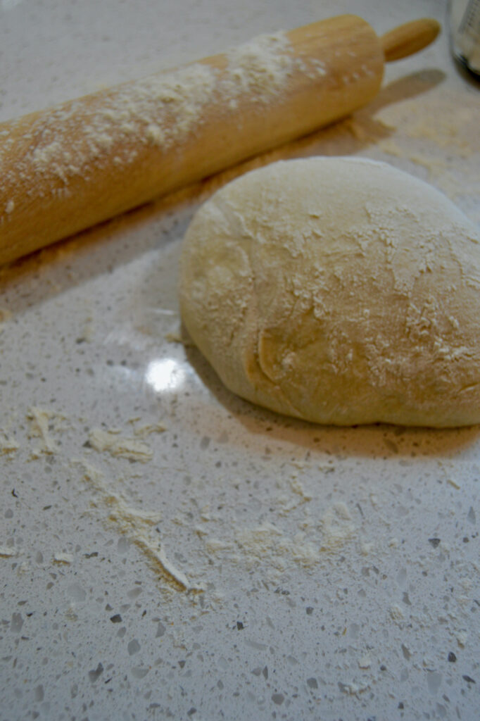 Sourdough Cinnamon Roll sweet dough ready to be rolled out and shaped.