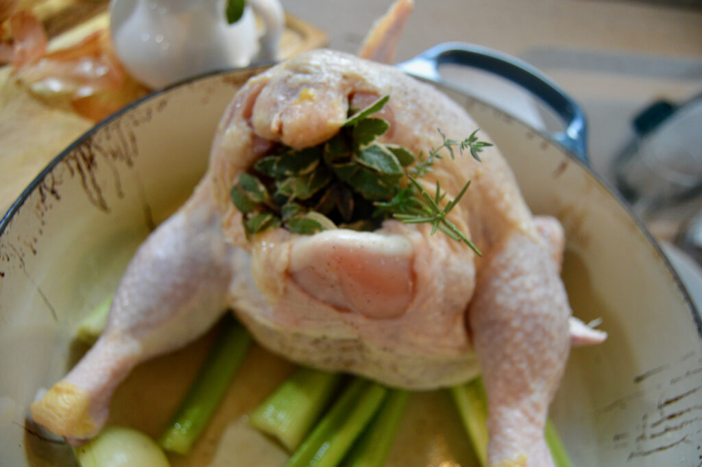 Stuff the carcass with onion, salt, pepper and fresh herbs.