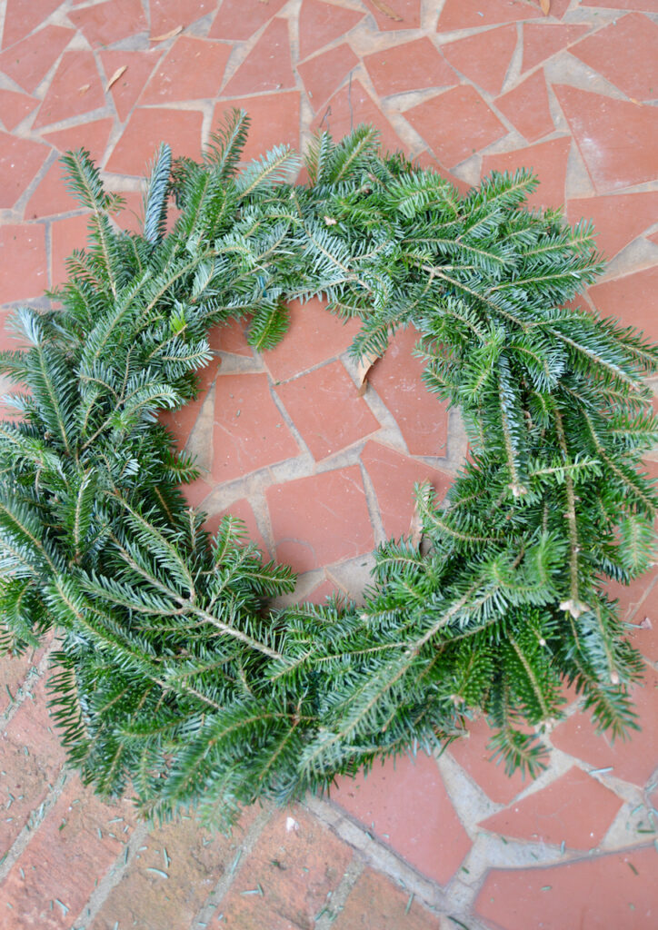 Either make your own wreath base or purchase one from the store. 