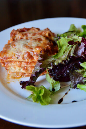 Layered lasagna with meat sauce, a family recipe. 